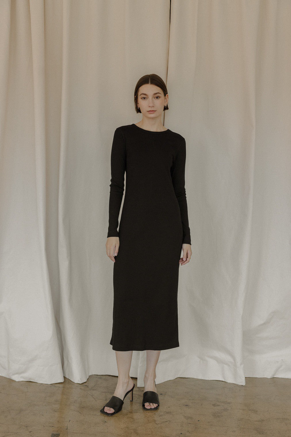 The Rhonda Dress is a midi-length