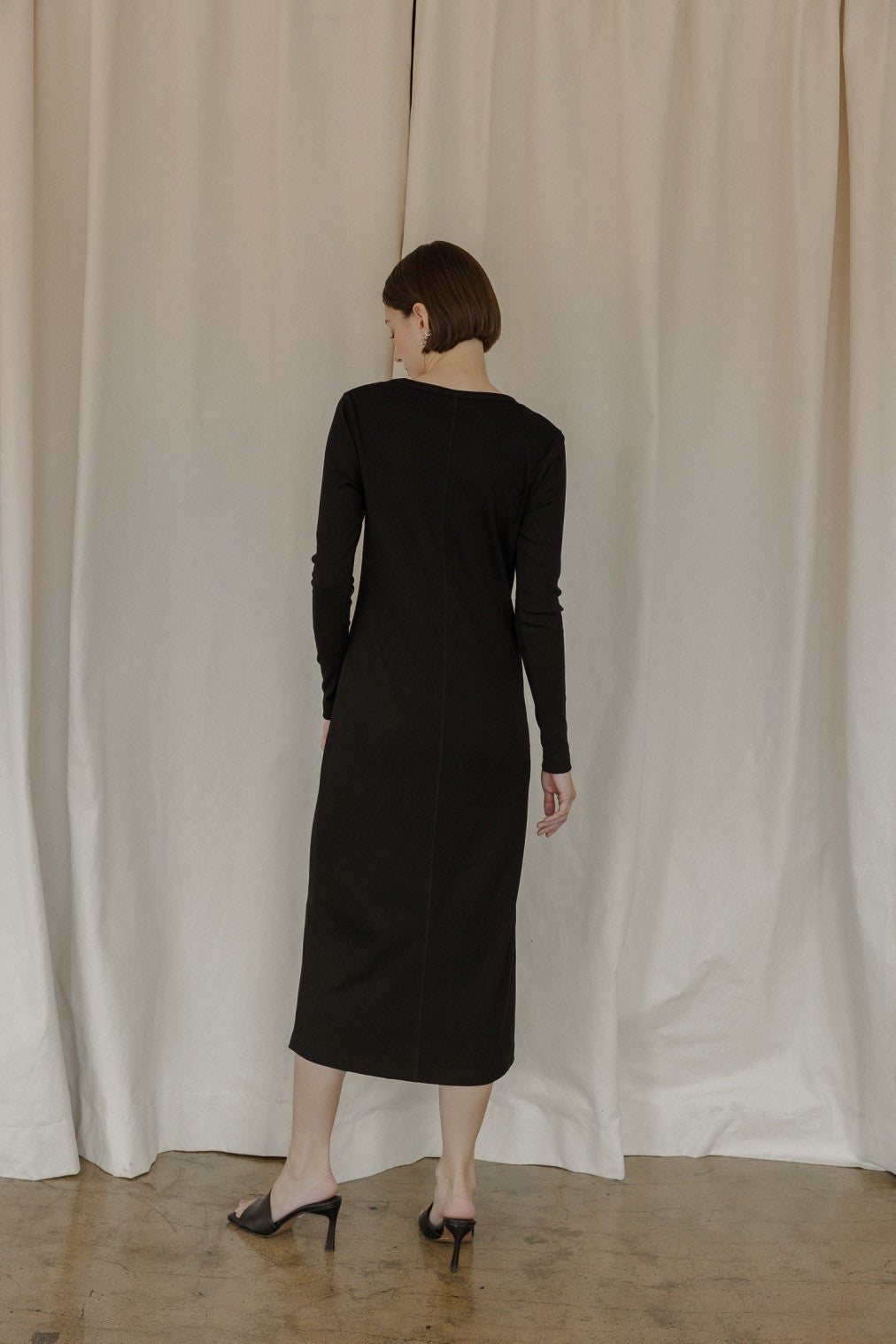 The Rhonda Dress is a midi-length