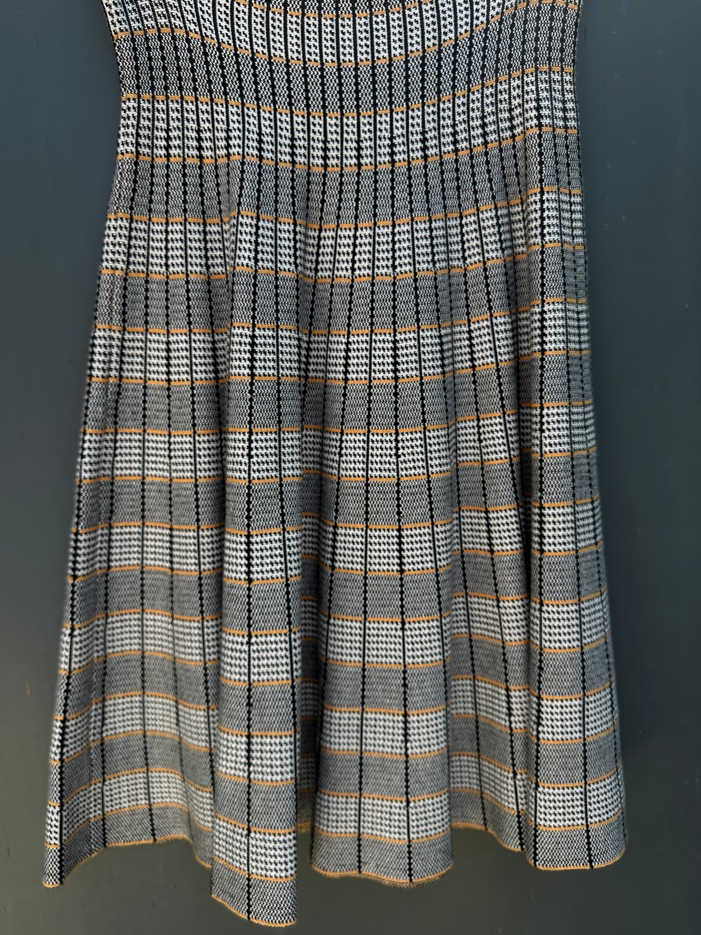 PLAID SLEEVE JACKET WITH YR RND SKIRT