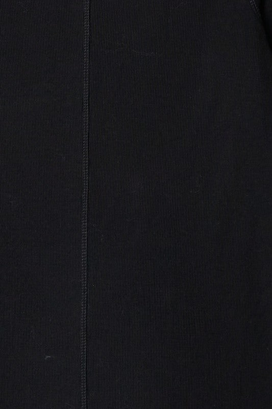 The Rhonda Dress is a midi-length