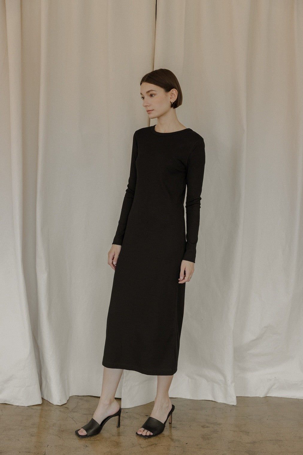 The Rhonda Dress is a midi-length