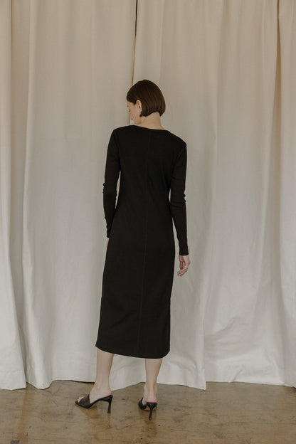 The Rhonda Dress is a midi-length