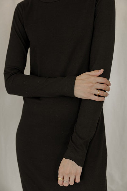 The Rhonda Dress is a midi-length