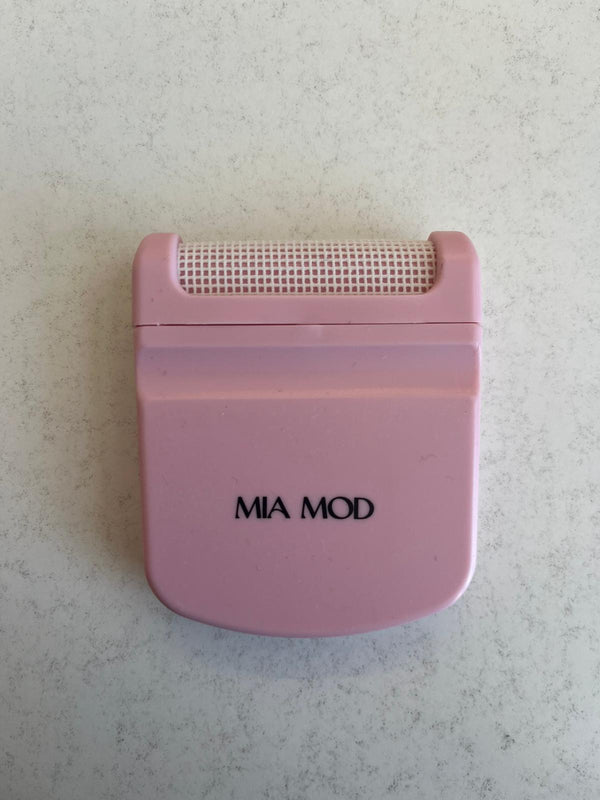 Pink Pocket Lint shaver